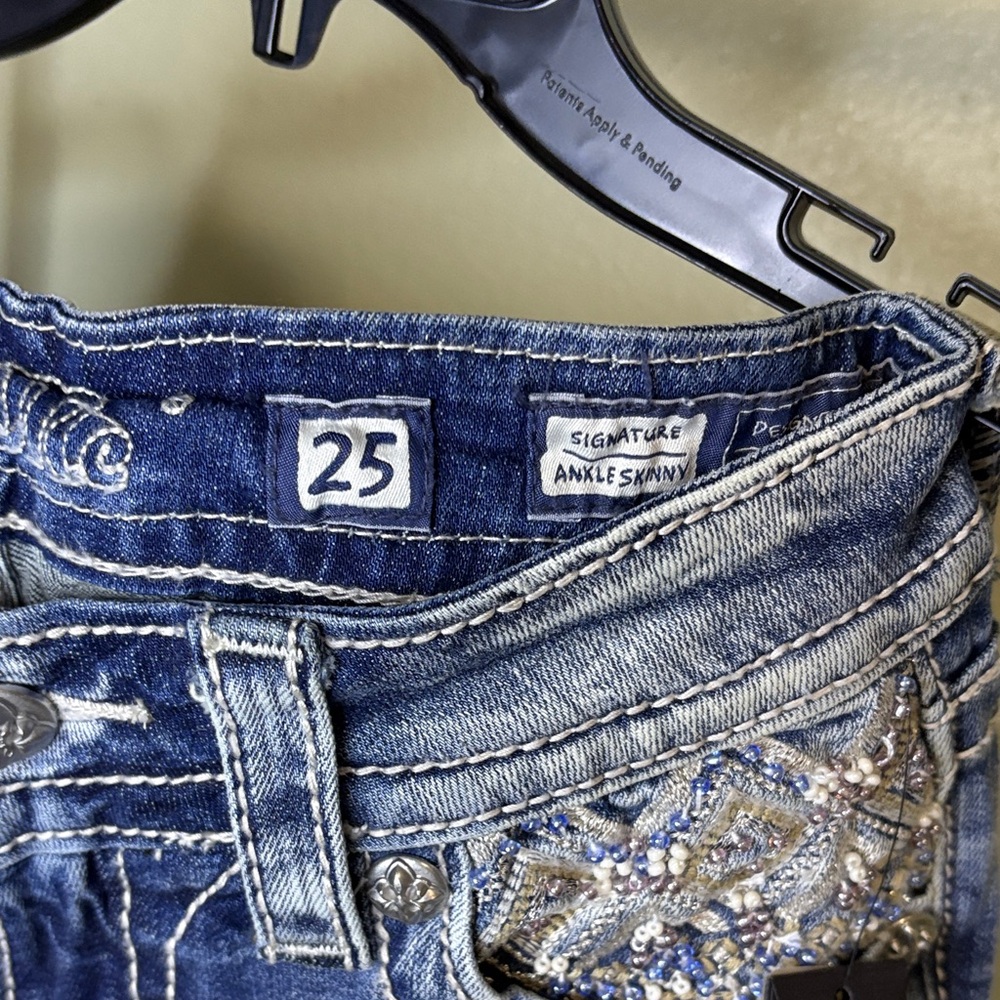 These Miss Me Embellished Skinny Jeans are a classic style statement! To make th - Picture 11 of 11